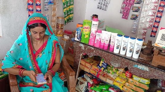 Photo shows woman running a business in India